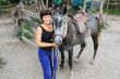 Portrait happy smiling woman with horse