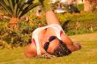 woman lying on meadow