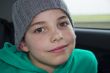 closeup of cute young teen boy in  gray hat