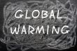 `Global Warming` written on a chalkboard 
