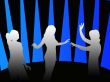 Silhouettes of girls dancing in a disco
