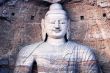 Giant buddha at Yungang Grottoes in Shannxi China