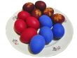 Easter eggs on the white plate isolated on the white background