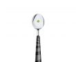 spoon with green peas