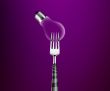 Forks around light bulb 
