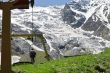 People on the chairs of cableway. Caucasian mountains