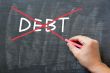 Debt being crossed out