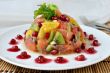 Fruit salad with salmon and pomegranate