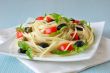 Spaghetti with tomato, capers and basil with olives