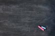 Smudged blackboard background with chalk and copy space