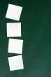Blank stick note on a green board