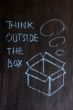 Chalk drawing - concept of `Think outside the box` 