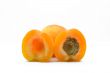 Juicy apricots on a white background