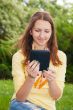 Teen girl reading electronic book