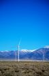 Power mills field in front of the mountain range