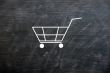 Chalk drawing of Shopping cart on a smudged blackboard