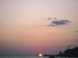 Round sun falling down over the Black sea