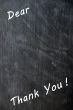 Thank you written with chalk on blackboard with copy space for extra text 