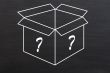 Open box with question marks drawn on smudged blackboard