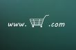 On-line shopping website on a green chalkboard