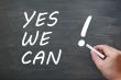 Yes we can - written with chalk on a blackboard