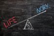 Balance of Life and work on a wooden blackboard