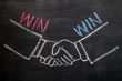 Mutual benefit concept of handshaking on blackboard
