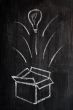 Concept of `Think Outside the box` drawn with chalk on a blackboard 