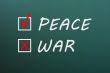 Peace and war with check boxes on a green chalkboard