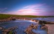 Waterfall in sunset light
