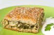 Aromatic green`s pie filling spinach and olives