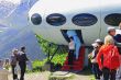Alien stealing a little boy near the UFO