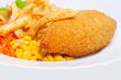 Chicken Kiev with corn and french fries