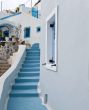 White buildings and blue staircase
