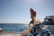 man relaxes on the open sea