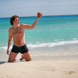 Man posing with the coconut in hand