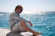 Man posing on the yacht