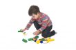 Boy with multicolored bricks