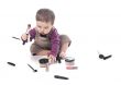 Baby girl with cosmetics