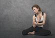 Sad woman, studio shot