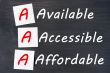 Acronym of AAA - available, accessible. affordable written on a blackboard 