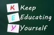 KEY acronym -Keep educating yourself on a blackboard with sticky notes