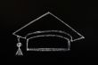 Trencher cap drawn with chalk on blackboard background