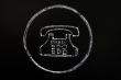 Old phone symbol drawn with chalk on blackboard background