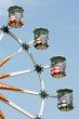 Ferris wheel against blue sky