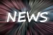 Chalk drawing of `News` on blurred chalkboard 