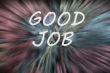 Good job written on a blurred background with motion rays