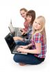 Three girls with laptops