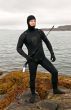Freediver in a diving suit on the Barents Sea