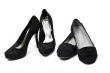 two pairs of female black suede shoes
